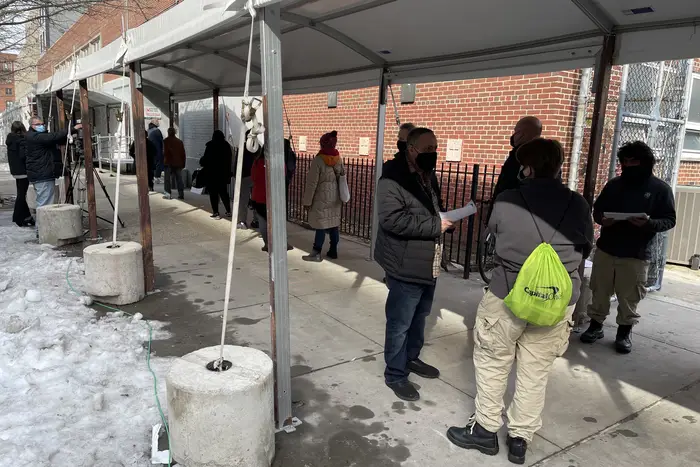 People line up to get a COVID-19 vaccine at the Medgar Evers College vaccination site in Brooklyn on February 24th, 2021.